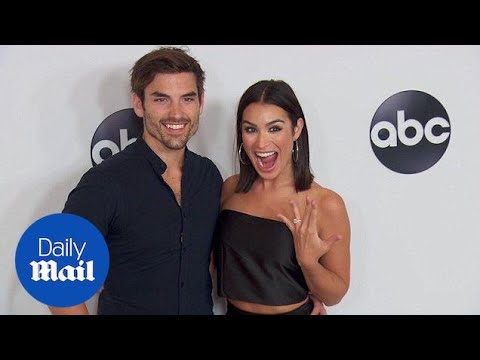 Shine bright! Ashley Iaconetti flashes fat diamond on carpet
