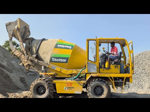 Self Loading Concrete Mixer in Action: Schwing Stetter SLM 4000 Working at Construction Site