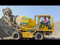 Self Loading Concrete Mixer In Action Schwing Stetter SLM 4000 Working At Construction Site
