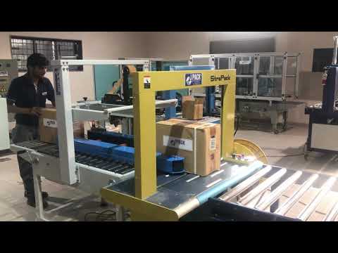 Box Sealing And Strapping Machine