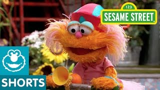 Sesame Street: Elmo Helps Zoe Ride a Scooter