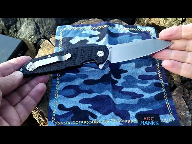 Vídeo relacionado con Azero y Salamandra Navaja TEK 812522 con apertura asistida por rodamientos con hoja de acero D2 de 8,6 cm y empuñadura de flax de 12,6 cm Caza,Pesca, Supervivencia y Bushcraft+Portabotellas de regalo