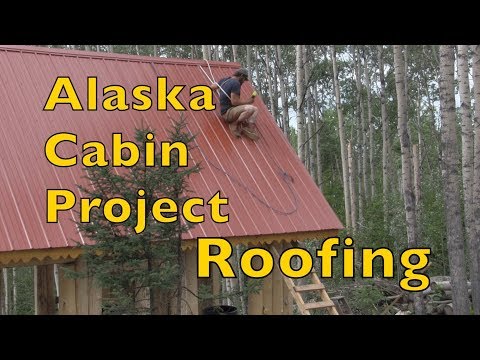 Alaskan Off Grid Log Cabin Project......roofing the cabin !