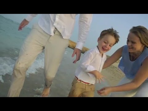 Family Runs On Beach Stock Video