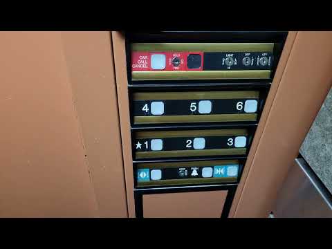 Reupload: Orange 1987 Dover Impulse Traction Middle Elevator @ 906 Everett Mall Way, Everett WA