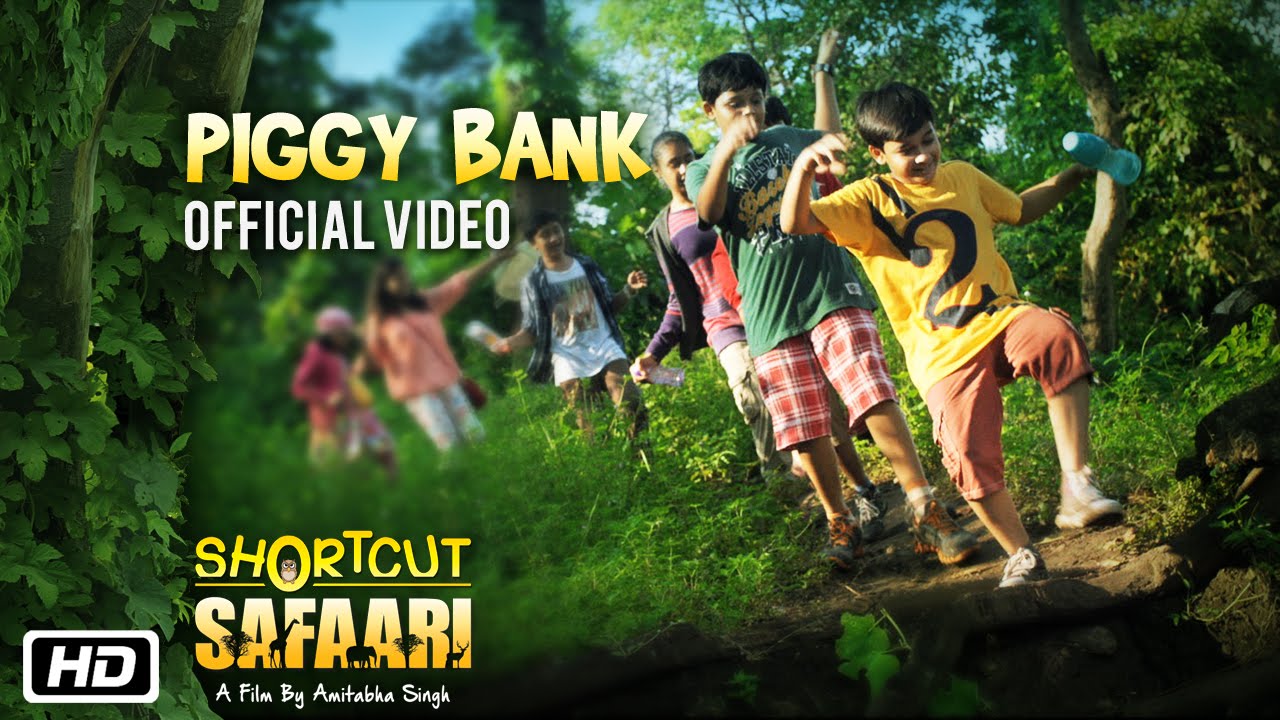 Piggy Bank Lyrics  | Shortcut Safari | Jimmy Shergill, Aashi Rawal | Shaan | Mana (Samir – Mana), Rohit Sharma