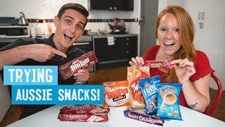 Trying The Best AUSTRALIAN SNACKS! - Tim Tams, Cherry Ripe, Cheezels, Fantales & MORE