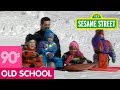 Sesame Street Kids Sledding In The Snow