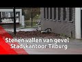 Deel van gevel valt  door wind meters naar beneden, fietser lichtgewond naar ziekenhuis