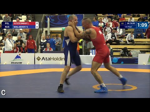 1/2 GR - 76 kg: V. MALAKHOV (RUS) df. L. SZSZESNIAK (POL), 1-1