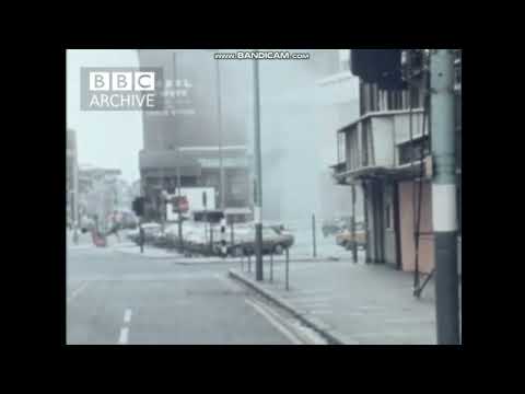 Two Provisional IRA car bombs detonate in Belfast city (caught on camera) film May 1972