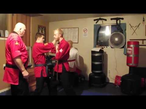 Tangkido Fighting Arts Federation knife defense tactics with counter attack.