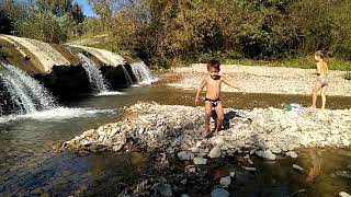 preview picture of video '5 minutes relaxing video of playing children near the waterfall'