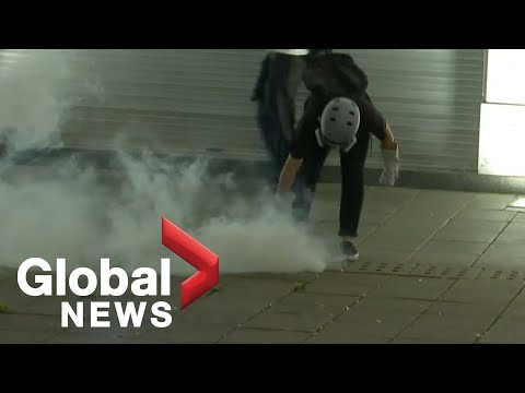 Hong Kong police fire tear gas at protesters as clashes continue