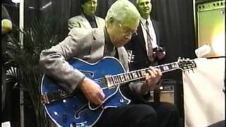 Kenny Burrell at NAMM 2004 with Rory Hoffman and Henry Johnson.