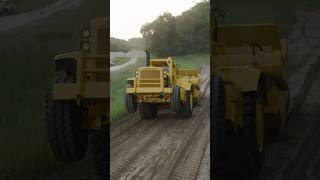 Operating a Classic CAT 660 Scraper — Doing Wheelies