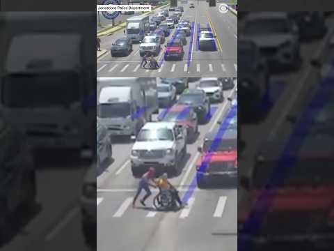 Person dressed as Spider-Man helps man in wheelchair cross busy intersection in Arkansas #shorts