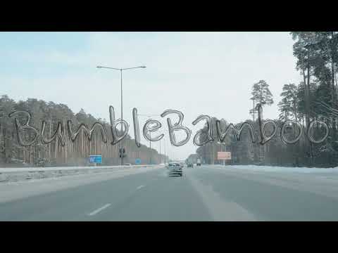 Windscreen view driving through a winter road with mud. Media.
