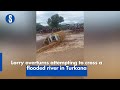 Lorry overturned while attempting to cross a flooded river in Turkana