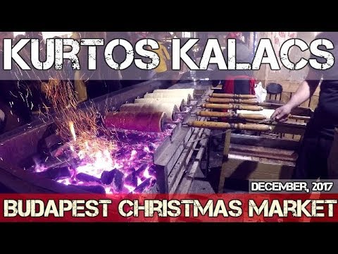Budapest Christmas Market - Kurtos Kalacs baking in the Budapest Christmas Market