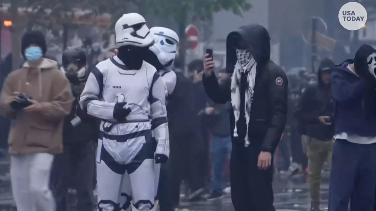 France protests see riot police in Paris use tear gas and water cannons, raw footage shows