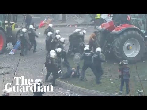 Police seen kicking demonstrator at farmers' protest in Brussels