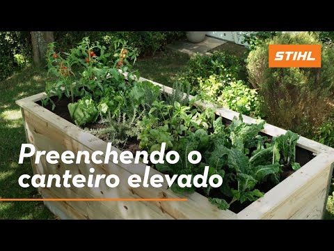 Aprenda como preencher um canteiro elevado de madeira