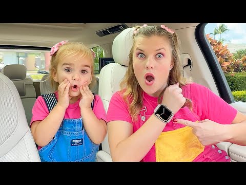 Alice with Auntie feed the animals on the farm