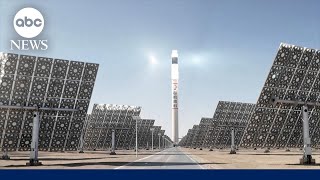 Solar thermal tower in Gansu province China surrounded by tracking mirrors