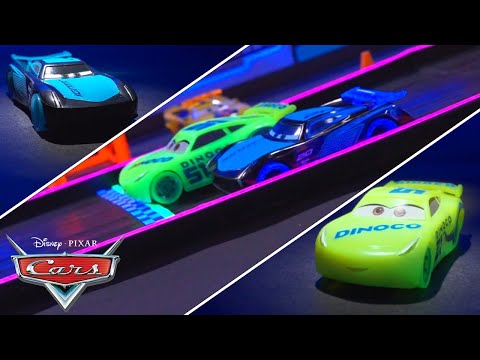 Jackson Storm Challenges Cruz Ramirez at the Glowing Racetrack | Pixar Cars