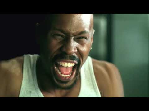 Dynamic still from the Next Day Air trailer capturing action and music-video energy