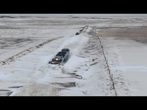 Canadian Train Plowing A HUGE Snowdrift