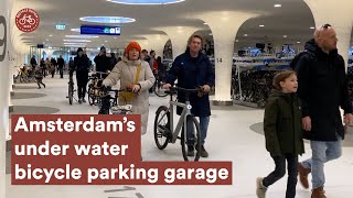 Il parcheggio sott'acqua per bici ad Amsterdam