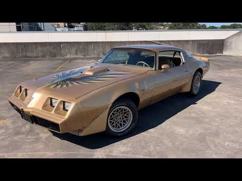 1979 Pontiac TransAm Firebird 6.6L V8 in Gold.