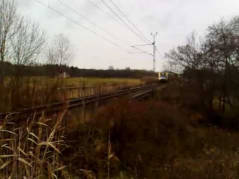 Commuter train blows it's horn as is passes Stora Höga on Bohusbanan