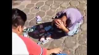Little boy 10 years Old selling cigarettes is hummiliated by gouvernment inspector in Mexico city.
