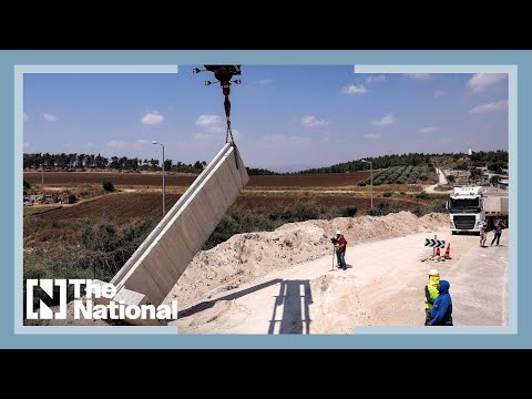 Israel builds new wall in West Bank