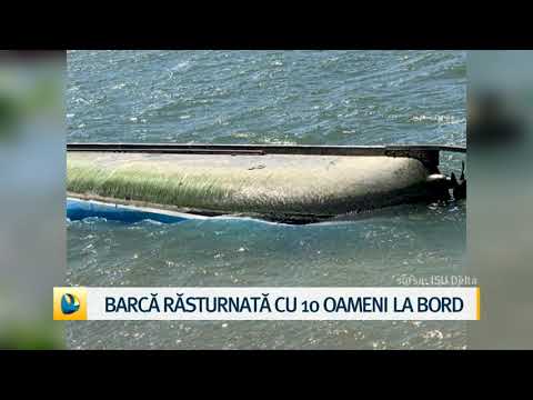 Barcă răsturnată cu 10 oameni la bord