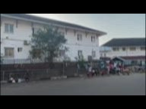 Grief and anxiety outside Freetown hospital