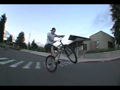 Steven Jensen Riding a Backwards Wheelie