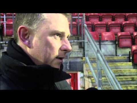 Mark Robins reacts to the 4-1 away win at Leyton Orient
