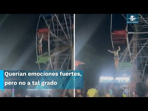 Rueda de la fortuna del terror; joven cae y otra queda colgando