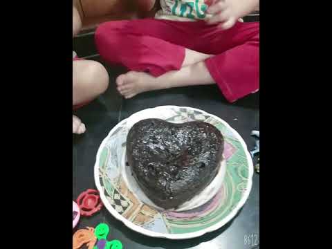 Decorating chocolate cake##with kinderjoy toys##also cake cut me and brother