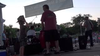 Buzzrique at Lake Harriet July 2014 - Bill on congas