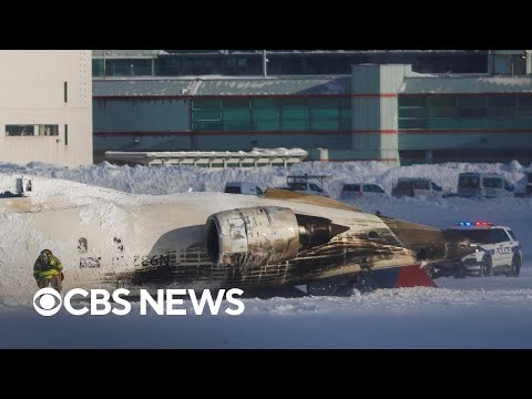Breaking News: Delta plane flips over after crash landing at Toronto airport, injuries reported