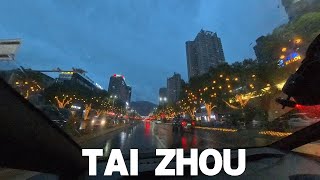 Night scene of Taizhou streets after rain