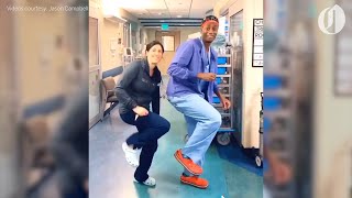 OHSU doctor dancing in hospital corridors offers r