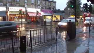 A rainy day on Cricklewood Broadway, Kilburn, London.