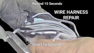 AUTOMOTIVE WIRING HARNESS REPAIR.  Short to ground repaired.