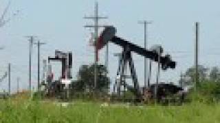 preview picture of video 'Two Oil Wells Pumping In Baytown Texas 2008'